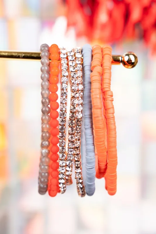 Bangles with twisted metal bands for flair -Own The Game Orange and Gray Beaded Bracelet Set