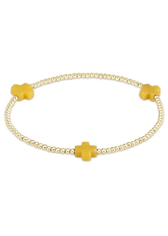 Bracelets with floral sapphire for romantic glow -SIGNATURE CROSS BRACELET - YELLOW