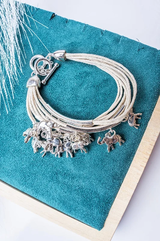 Gold bracelets with delicate diamond charm accents -SALE! Silvertone and Ivory Elephant Charm Multi-Strand Bracelet