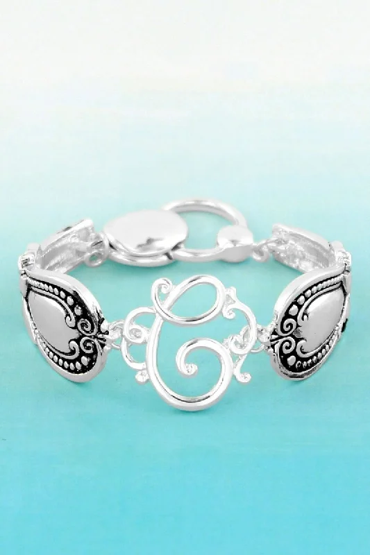 Bangles with hammered silver for rustic appeal -SALE! Silvertone 'C' Flourish Initial Spoon Bracelet