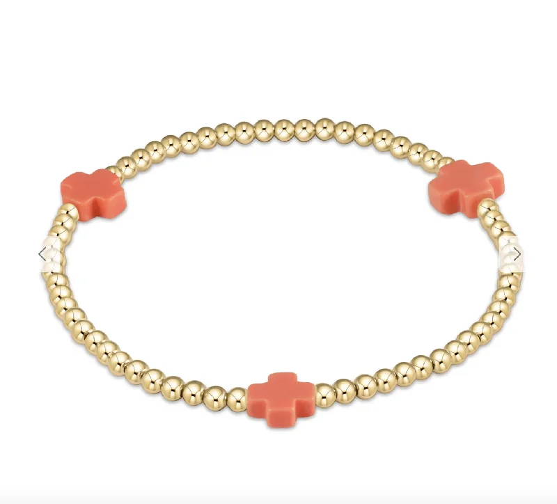 Bracelets with moonstone gems for mystic appeal -signature cross gold pattern 3mm bead bracelet - coral by enewton