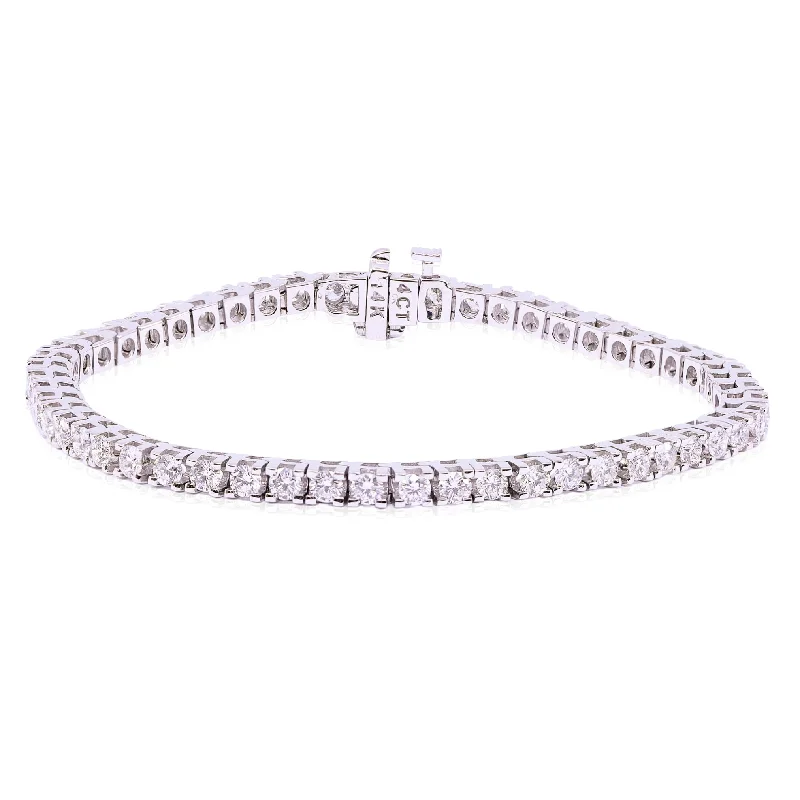 Bracelets with spiral designs for eye-catching twist -14K WHITE GOLD DIAMOND TENNIS BRACELET - 4.00CTW