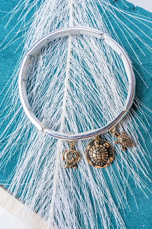 Silver bangles with polished mirror finish shine -SALE! Two-Tone Turtle Triple Charm Stretch Bracelet