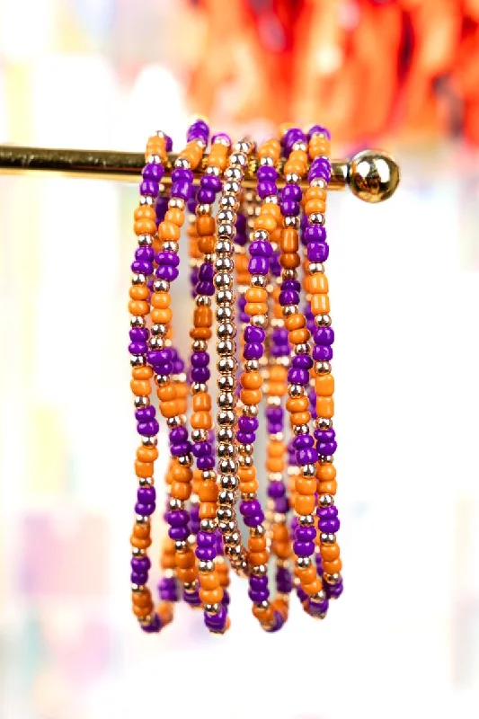 Bangles with engraved floral patterns for elegance -Our Team Purple and Orange Seed Bead Bracelet Set